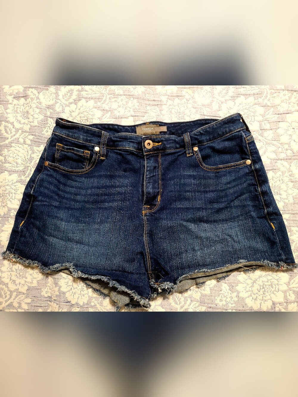 Torrid raw hem Jean shorts